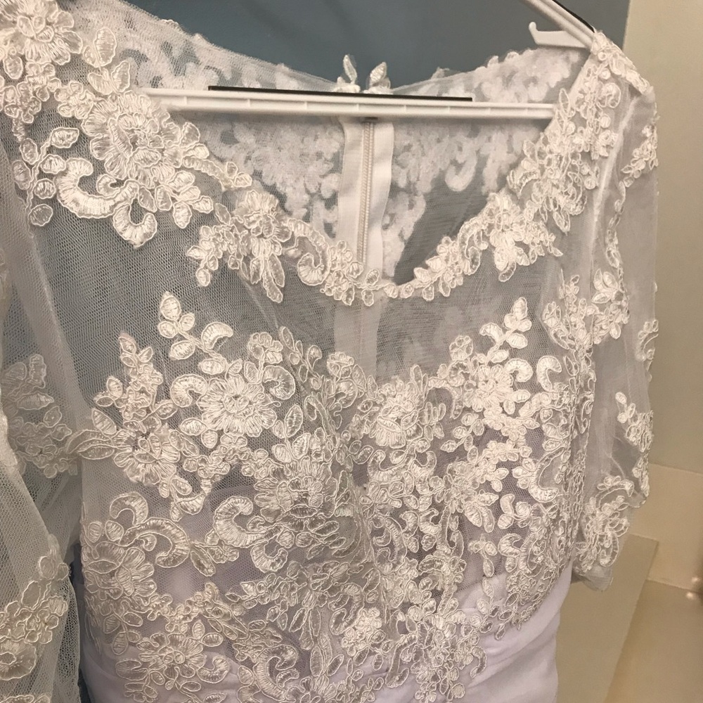 Davids Bridal sexy, bateau neck, 3/4 sleeve dress.